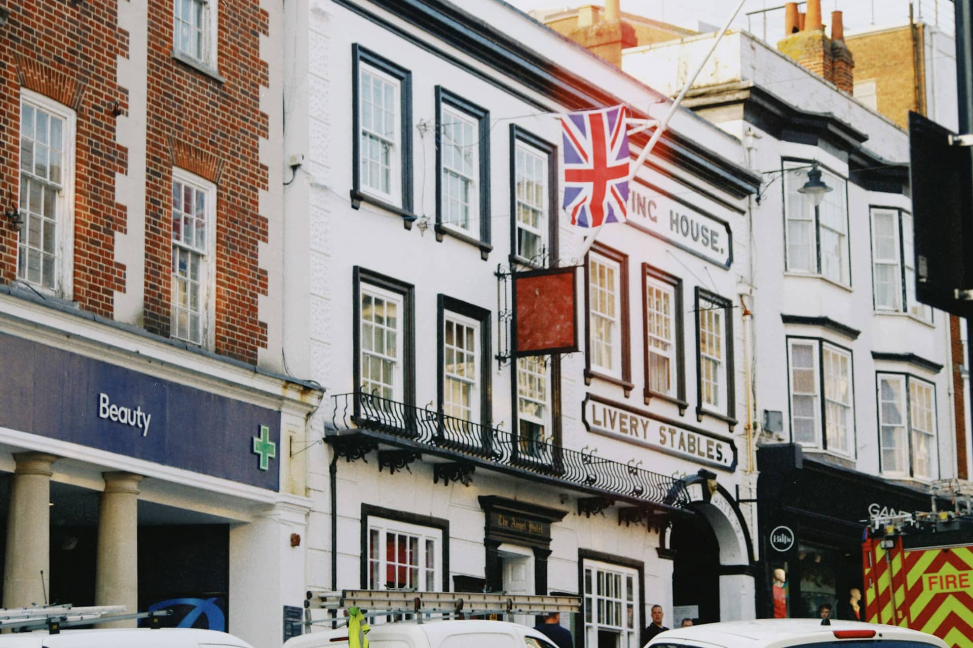 A row of commercial properties on a high street.