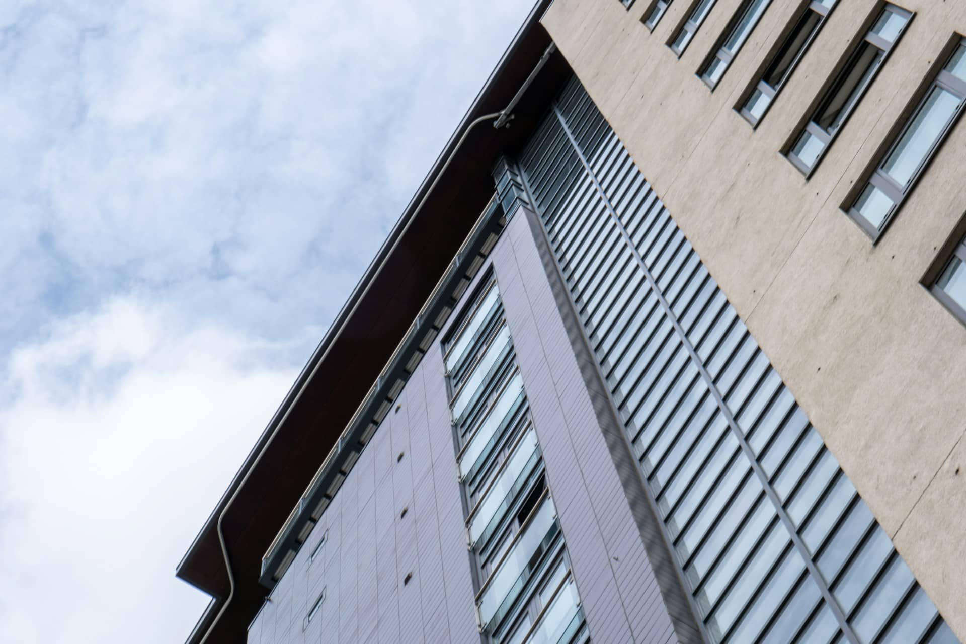 A picture looking up at a block of flats, primarily catering for DSS tenants.