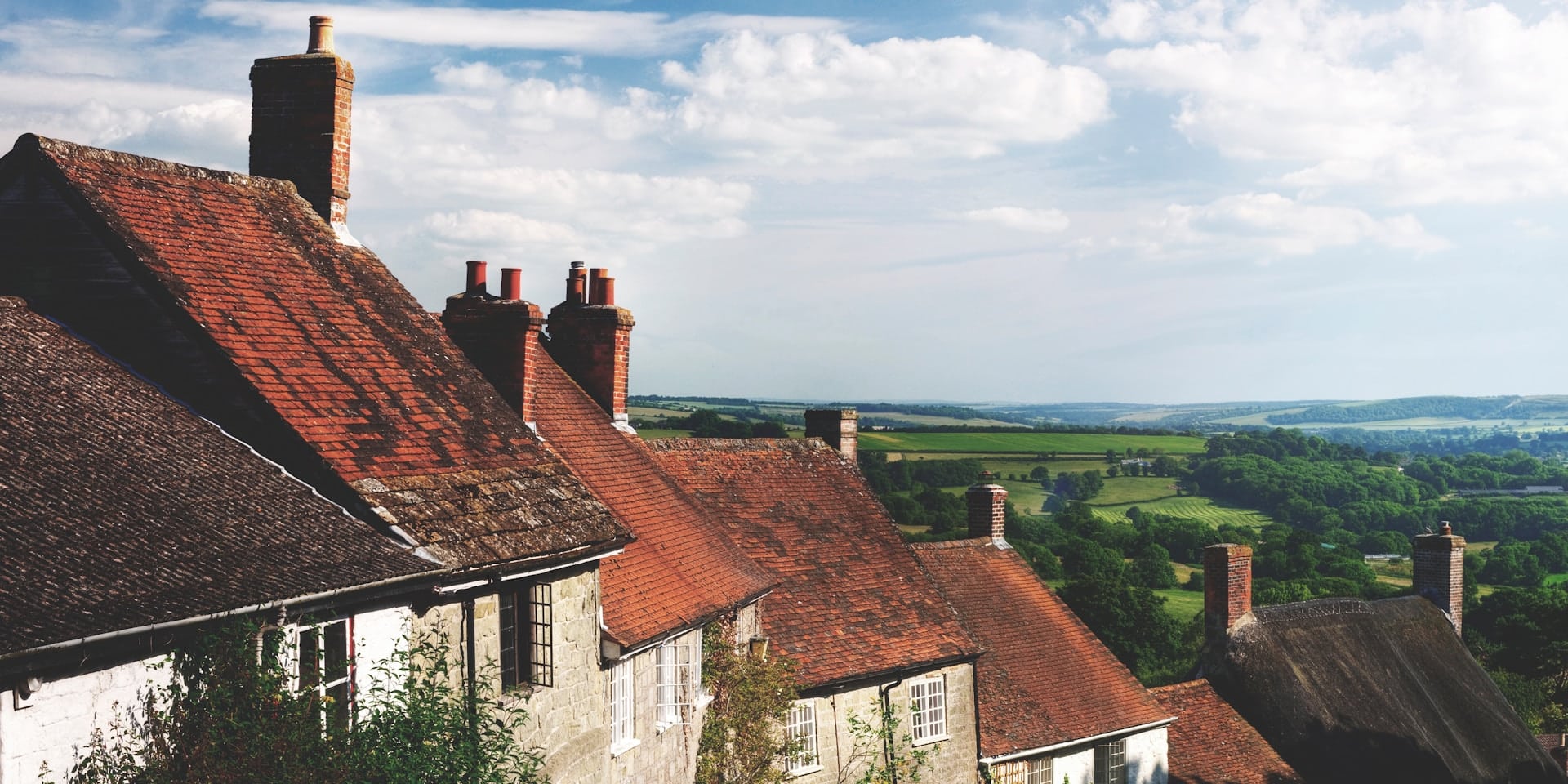 A row of rented houses, symbolising landlord portfolio insurance.